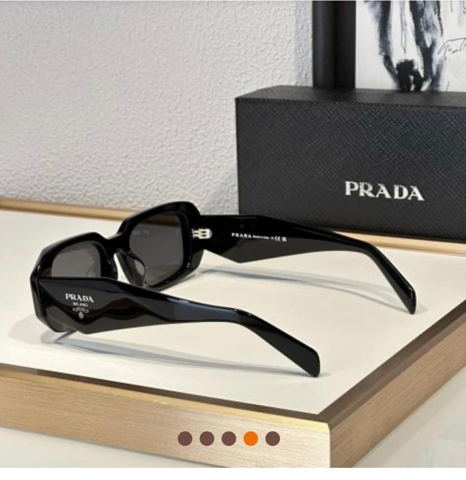 Women’s black Prada sunglasses