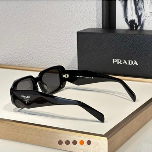 Women’s black Prada sunglasses