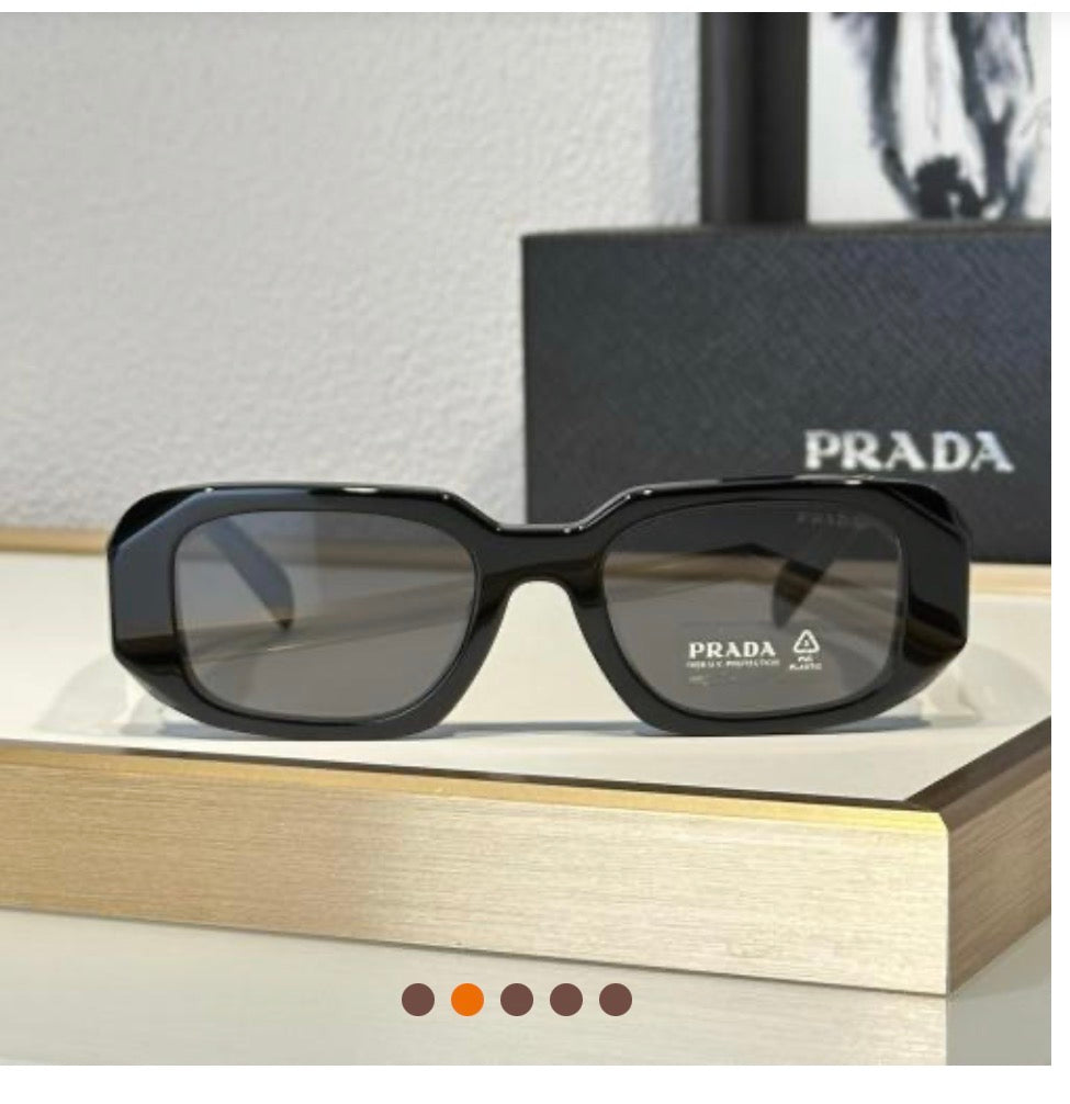 Women’s black Prada sunglasses