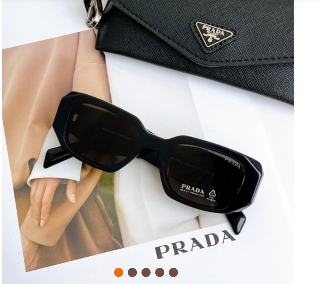 Women’s black Prada sunglasses