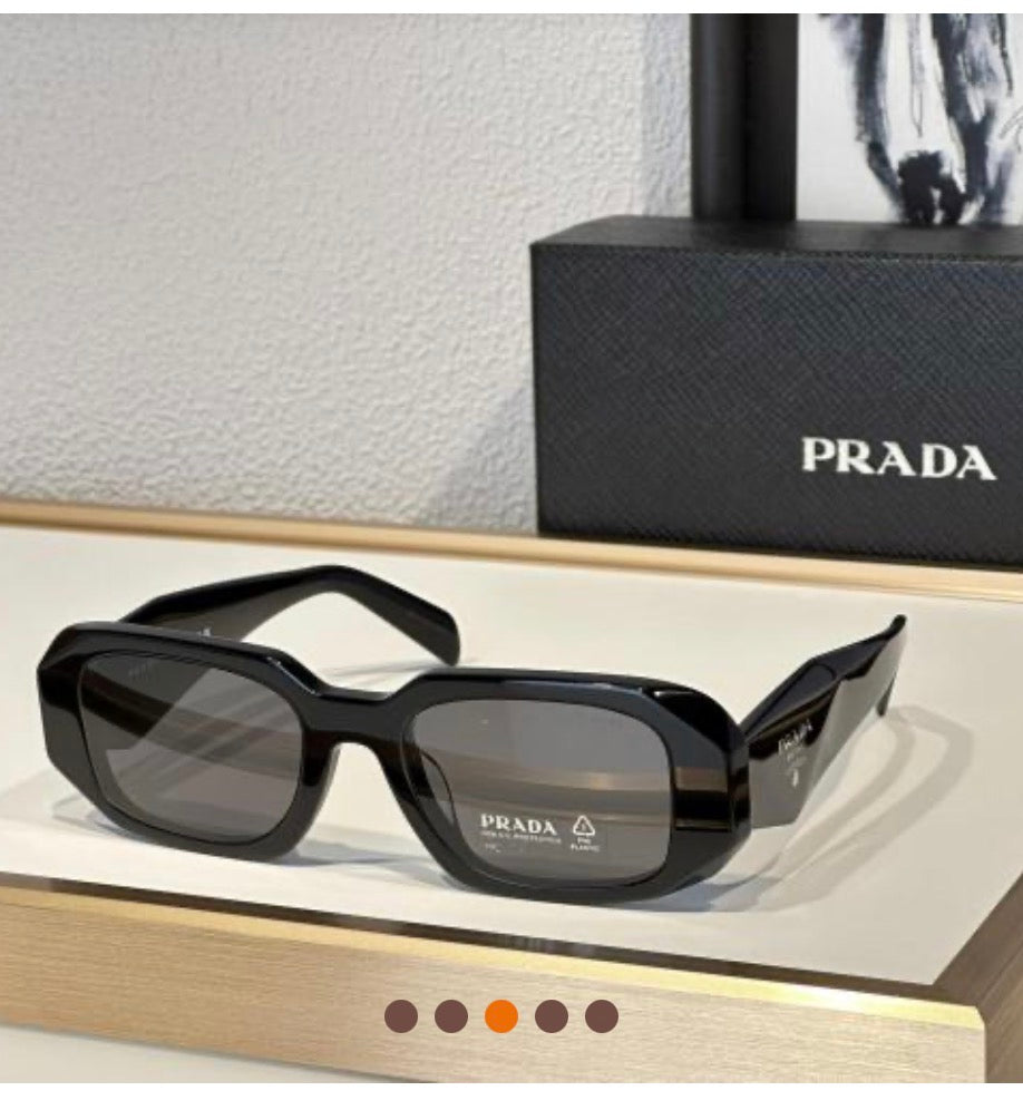 Women’s black Prada sunglasses